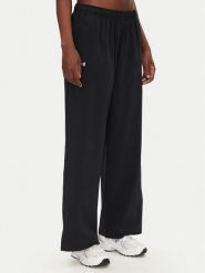 Under Armour Spodnie dresowe Rival 1386453 Czarny Wide Leg. Czarne spodnie dresowe Under Armour, bez wzorów, z dresówki. Za 159.99 zł.