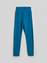 4F Legginsy treningowe szybkoschnące damskie - turkusowe XL. Niebieskie legginsy 4f, bez wzorów, z materiału. Za 119.99 zł.