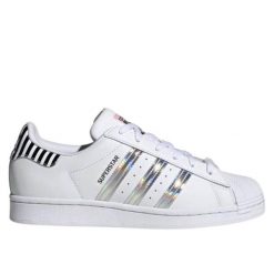 Buty do chodzenia damskie Adidas Superstar W. Białe buty treningowe adidas, bez wzorów, bez zapięcia, trekkingowe, Adidas Superstar. Za 389.00 zł.