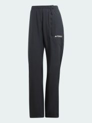 Adidas Spodnie przeciwdeszczowe w kolorze czarnym rozmiar: 40. Czarne spodnie dresowe adidas, bez wzorów, outdoorowe. Za 180.06 zł.
