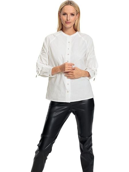 Heine Bluzka w kolorze białym rozmiar: 38. Białe bluzki Heine, bez wzorów, z bawełny, bez kołnierzyka, bez ramiączek. Za 43.78 zł.