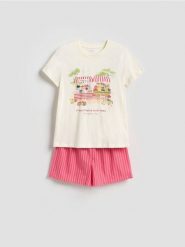 Dwuczęściowa piżama z nadrukiem - czerwony. Czerwone piżamy Reserved, l, bez wzorów, z bawełny, bez kołnierzyka, bez ramiączek. Za 109.99 zł.