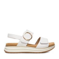 Sandały Remonte. Białe sandały Remonte, bez wzorów, bez obcasa, na płaskiej podeszwie, bez zapięcia. Za 369.99 zł.