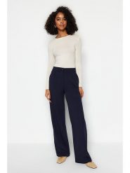 Trendyol Spodnie w kolorze granatowym rozmiar: 42. Niebieskie spodnie materiałowe Trendyol, bez wzorów, z materiału, z podwyższonym stanem. Za 65.99 zł.