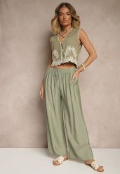 Jasnozielone Spodnie z Wiskozy High Waist o Szerokim Kroju Divlise. Zielone jeansy Renee, bez wzorów, z jeansu, eleganckie, z podwyższonym stanem. W wyprzedaży za 29.99 zł.