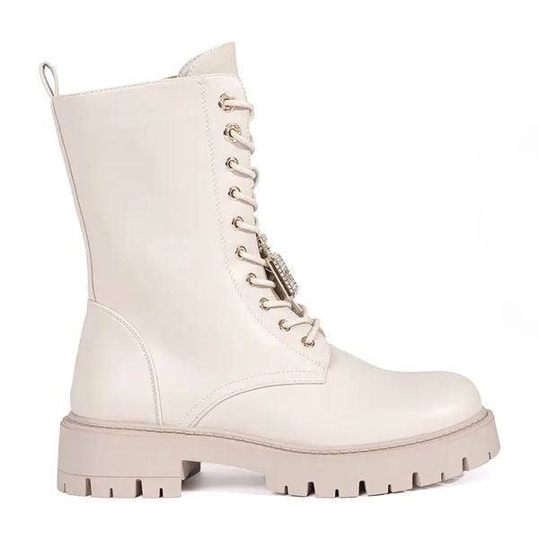 Seastar Jasnobeżowe botki workery damskie z przypinkami beżowy. Brązowe botki bez wzorów, bez obcasa, bez zapięcia. Za 245.97 zł.