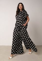 Czarny Komplet w Kropki Bluzka z Wiązaniem przy Dekolcie i Szerokie Spodnie Chrirla. Czarne bluzki Born2be, m, bez wzorów, eleganckie, bez kołnierzyka, bez ramiączek. Za 139.99 zł.