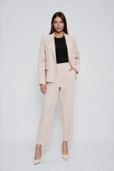 Spodnie cygaretki beżowe. Brązowe chinosy MOODO, l, bez wzorów, z elastanu. Za 149.99 zł.