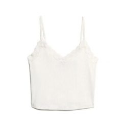 Krótki top z koronkowymi wykończeniami dla kobiet Superdry Athletic Essentials. Białe topy Superdry, l, bez wzorów, z koronki, eleganckie, bez kołnierzyka, bez ramiączek. W wyprzedaży za 99.70 zł.