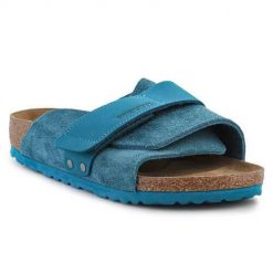 Klapki damskie Birkenstock Kyoto. Niebieskie klapki Birkenstock, bez wzorów, z materiału, bez obcasa, bez zapięcia. Za 785.95 zł.
