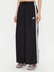 Adidas Spodnie dresowe Essentials 3-Stripes JE1306 Czarny Loose Fit. Czarne spodnie dresowe adidas, bez wzorów, z dresówki. Za 199.99 zł.
