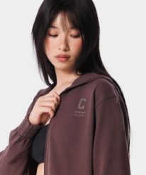 Rozpinana bluza sportowa dla kobiet Carpatree Varsity Chic. Czarne bluzy z kapturem Carpatree, s, bez wzorów, z bawełny, na fitness i siłownię. Za 215.99 zł.