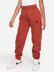 Nike Spodnie dresowe w kolorze ceglanym rozmiar: L. Pomarańczowe spodnie dresowe Nike, bez wzorów, z bawełny. Za 127.65 zł.