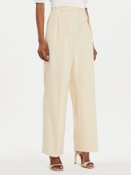 Tommy Hilfiger Spodnie materiałowe Core WW0WW39725 Beżowy Relaxed Fit. Brązowe spodnie materiałowe Tommy Hilfiger, bez wzorów, z materiału. Za 419.99 zł.