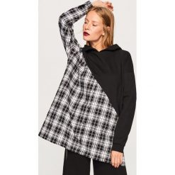 Długa bluza z łączonych materiałów - Czarny. Bluzy marki DOMYOS. W wyprzedaży za 49.99 zł.