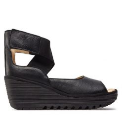 Sandały Fly London. Czarne sandały Fly London, bez wzorów, bez obcasa, na koturnie, bez zapięcia. Za 639.99 zł.