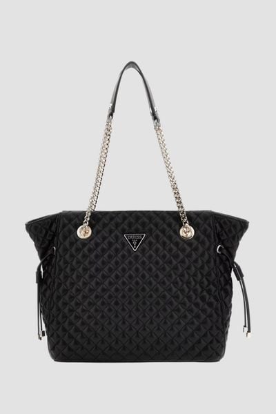 GUESS Czarna damska torebka Everlee Tote. Czarne shopper bag Guess, z aplikacjami, ze skóry ekologicznej, eleganckie, bez dodatków. W wyprzedaży za 423.99 zł.