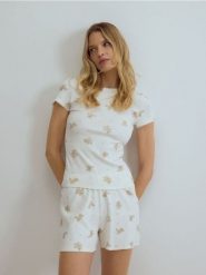 Dwuczęściowa piżama z bawełną - złamana biel. Piżamy Reserved, l, bez wzorów, z bawełny, bez kołnierzyka, bez ramiączek. Za 89.99 zł.