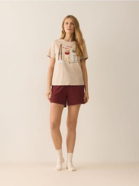 Dwuczęściowa piżama z nadrukiem - bordowy. Czerwone piżamy Reserved, l, bez wzorów, z bawełny, bez kołnierzyka, bez ramiączek. Za 79.99 zł.