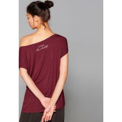 Sportowa koszulka Athleisure - Bordowy. T-shirty sportowe marki DOMYOS. W wyprzedaży za 29.99 zł.