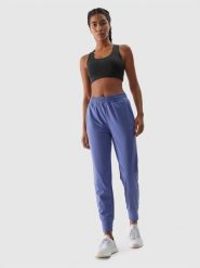 4F Spodnie treningowe szybkoschnące damskie - granatowe M. Niebieskie spodnie dresowe 4f, bez wzorów, z dzianiny. W wyprzedaży za 99.99 zł.