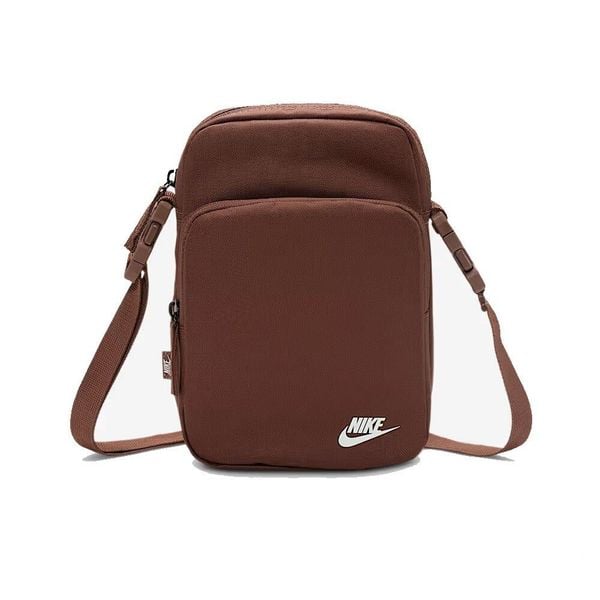 Saszetka na ramię Nike Nk Heritage Crossbody. Brązowe nerki i saszetki Nike, bez wzorów, sportowe, bez dodatków. Za 110.99 zł.