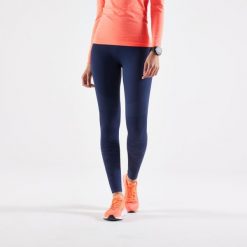 Legginsy do biegania damskie Kiprun Care. Niebieskie legginsy KIPRUN, bez wzorów, z elastanu, sportowe. W wyprzedaży za 89.99 zł.