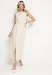 Jasnobeżowa Sukienka Dopasowana z Bawełną i Wiskozą z Rozcięciem Turilia. Brązowe sukienki Born2be, na co dzień, m, bez wzorów, z bawełny, eleganckie, bez kołnierzyka, bez ramiączek, maxi, dopasowane. W wyprzedaży za 93.49 zł.