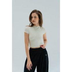 Koszulka do jogi Moonholi Timeless z krótkim rękawem. Białe t-shirty sportowe MOONHOLI, l, bez wzorów, bez ramiączek, na fitness i siłownię. Za 189.00 zł.