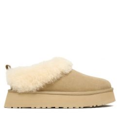 Śniegowce Ugg. Brązowe śniegowce UGG, bez wzorów, bez zapięcia. Za 719.99 zł.