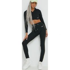 Ellesse legginsy damskie kolor czarny gładkie. Czarne legginsy Ellesse, bez wzorów. Za 149.99 zł.