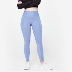 Legginsy fitness damskie Domyos. Czarne legginsy DOMYOS, bez wzorów, z materiału, sportowe. Za 99.99 zł.