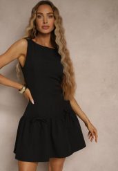 Czarna Sukienka Vices Drop Waist Bez Rękawów z Kokardkami i Falbanką Follena. Czarne sukienki Renee, na co dzień, l, z aplikacjami, klasyczne, bez kołnierzyka, bez ramiączek, mini. W wyprzedaży za 107.99 zł.