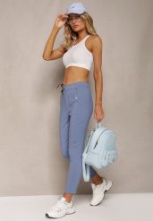 Niebieskie Spodnie o Długości 7/8 ze Sznureczkiem w Pasie Astara. Niebieskie jeansy Renee, l, bez wzorów, z bawełny, biznesowe. Za 59.99 zł.