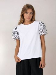 Bawełniana bluzka z ozdobnymi falbanami - biały. Białe bluzki Sinsay, l, bez wzorów, z bawełny, bez kołnierzyka, bez ramiączek. Za 29.99 zł.