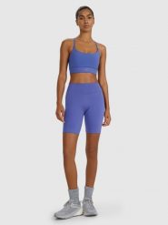 4F Legginsy kolarki treningowe damskie - granatowe XL. Niebieskie legginsy 4f, bez wzorów, z dzianiny, sportowe, krótkie. W wyprzedaży za 89.99 zł.