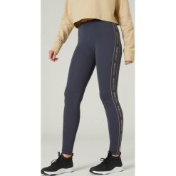 Legginsy fitness FIT+. Niebieskie legginsy DOMYOS, bez wzorów, z bawełny, sportowe. Za 59.99 zł.