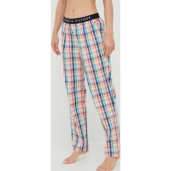 Tommy Hilfiger spodnie piżamowe bawełniane bawełniana. Piżamy Tommy Hilfiger, l, bez wzorów, z bawełny, bez kołnierzyka, bez ramiączek. W wyprzedaży za 159.99 zł.