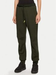 Champion Spodnie dresowe 117477 Zielony Slim Fit. Zielone spodnie dresowe Champion, bez wzorów, z dresówki. Za 139.99 zł.
