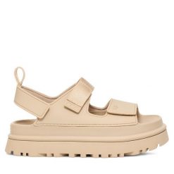 Sandały Ugg. Brązowe sandały UGG, bez wzorów, bez obcasa, na koturnie, bez zapięcia. Za 399.99 zł.