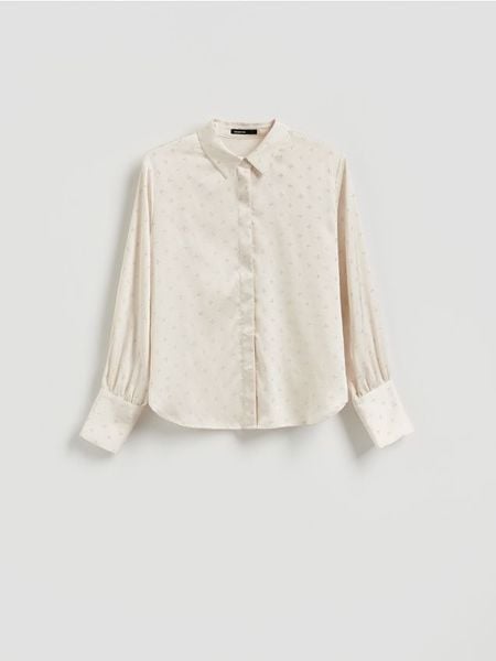 Koszula ze strasem - złamana biel. Koszule Reserved, l, bez wzorów, z tkaniny, bez kołnierzyka, bez ramiączek. Za 159.99 zł.