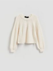 Sweter z kokardką z tyłu - złamana biel. Swetry Reserved, l, bez wzorów, z dzianiny, bez ramiączek. Za 139.99 zł.