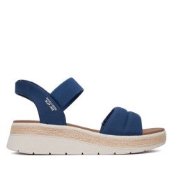 Sandały Skechers. Niebieskie sandały Skechers, bez wzorów, bez obcasa, na płaskiej podeszwie, bez zapięcia. Za 289.99 zł.