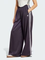 Adidas Spodnie dresowe w kolorze fioletowym rozmiar: 40. Różowe spodnie dresowe adidas, bez wzorów, z dresówki. Za 136.13 zł.