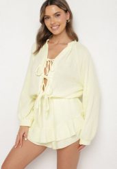 Żółty Wiązany Bawełniany Kombinezon Boho z Falbankami i Wiązaniem Lalelia. Żółte sukienki Born2be, na co dzień, uniwersalny, bez wzorów, z bawełny, boho, bez kołnierzyka, bez ramiączek, proste. W wyprzedaży za 127.49 zł.