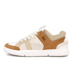 Uniseksowe buty do biegania elegancja inspirowana tenisem THE ROGER CLUBHOUSE. Brązowe buty do biegania On Running, bez wzorów, bez zapięcia, do biegania. Za 657.00 zł.