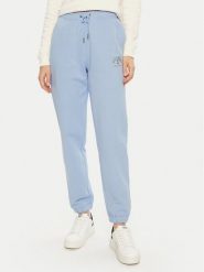 Guess Jeans Spodnie dresowe W5RB63 K68I4 Niebieski Regular Fit. Niebieskie spodnie dresowe Guess Jeans, z aplikacjami, z bawełny. Za 169.99 zł.