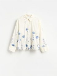 Bawełniana koszula w kwiaty - złamana biel. Koszule Reserved, l, bez wzorów, z bawełny, bez kołnierzyka, bez ramiączek. Za 139.99 zł.