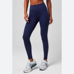 Damskie legginsy Fabletics On-The-Go. Niebieskie legginsy FABLETICS, bez wzorów, sportowe. Za 327.85 zł.