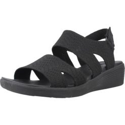 Sandały SKECHERS ARYA MODERN MUSE Czarny. Czarne sandały Skechers, bez wzorów, z tkaniny, bez obcasa, bez zapięcia. Za 216.99 zł.